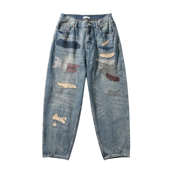 Ripped Repaired Jeans with Paint-Splatter-Style Fabric Patches Front