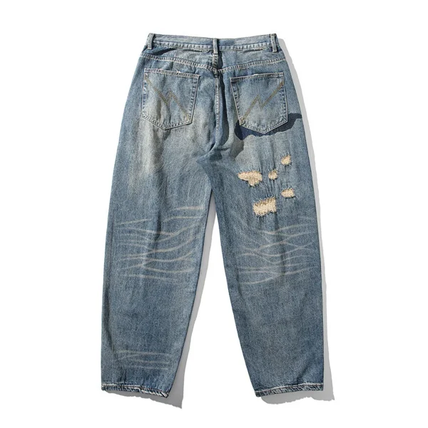 Ripped Repaired Jeans with Paint-Splatter-Style Fabric Patches Back