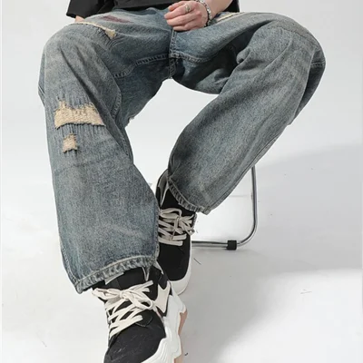 Ripped Repaired Jeans with Paint-Splatter-Style Fabric Patches 04