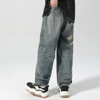 Ripped Repaired Jeans with Paint-Splatter-Style Fabric Patches 05